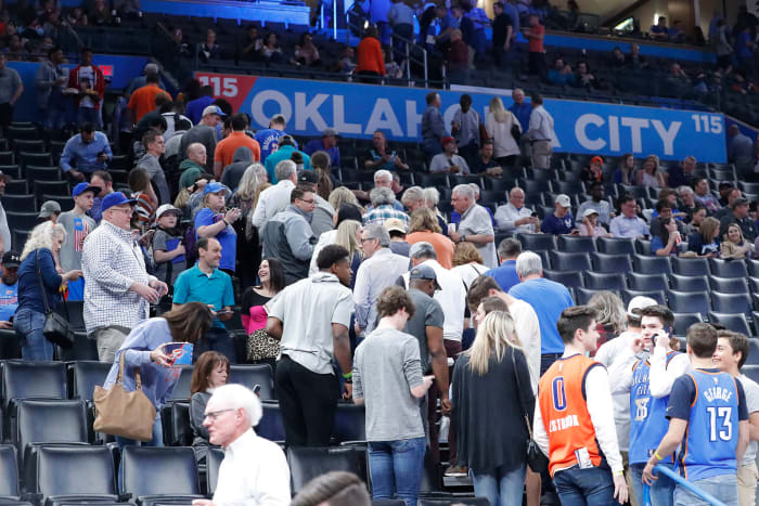 Fans leave after being told the Oklahoma City Thunder vs. Utah Jazz game had been cancelled just before tip off.